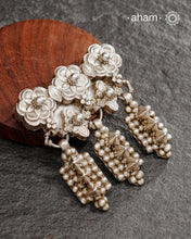 A vintage piece that we found in one of our scouring expeditions. Seems to be a piece of a vintage belt bulk which we have converted into a pendant. A solid, bold, Very unusual piece from a bygone area, that bring back memories and stories of that time. Wear it with a long chain or with a black thread, or layer them to create a distinct look.