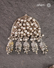 Originally part of the leg phool (Leg anklet with toe rings) the main piece has been converted into a stunning pendant. Lots of ghungroos add to the rustic charm of the piece. Beautiful handcrafted tribal silver pendant from a bygone area, that bring back memories and stories of that time. Wear it with a long chain or with a black thread, or layer them to create a distinct look.