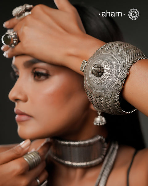 Vintage Rigid Silver armlet with weave work and flower pattern on top. Statement vintage silver kada with intricate floral work, handcrafted by skilful artisans. Beautiful piece from a bygone era, that bring back memories and stories of that time.