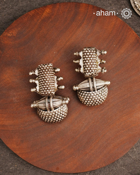 An exquisite fusion of the past and present, these Vintage Tribal Earrings unite two stunning vintage Silver amulets steeped in history. Handcrafted in silver, this unique piece is a must-have for those who cherish tribal heritage jewellery with a story to tell.