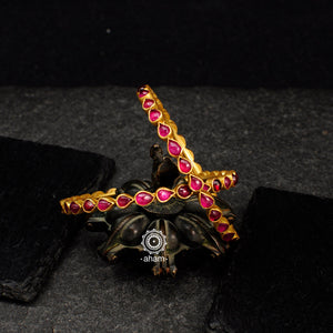 Handcrafted 92.5 sterling silver bangles with gold polish and rani pink kundan work. Perfect pair for special occasions and gifting.