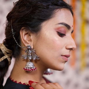 One of kind silver Jhumki. Comes with the ear chain so its easy to wear.