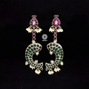 A classy, versatile silver earrings laced with pearls that can be used with your traditional and contemporary outfits