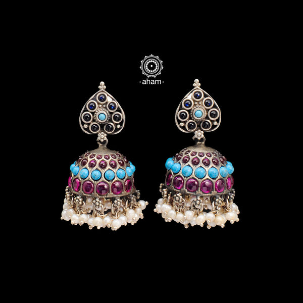 Handcrafted pair of Nrityam jhumkie earrings in 92.5 sterling silver. Including blue and kemp stone setting and hanging cultured pearls. 