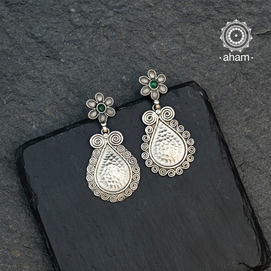 Beautiful Mewad drop earrings with a green stone flower stud. Handcrafted in 92.5 sterling silver, an ode to the glorious state of Rajasthan.