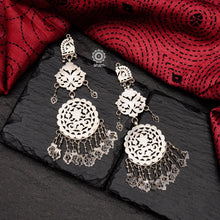 Mewad cutwork peacock earrings handcrafted in silver. An ode to the glorious state of  Rajasthan. Statement long earrings that look great with both ethnic and western outfits.