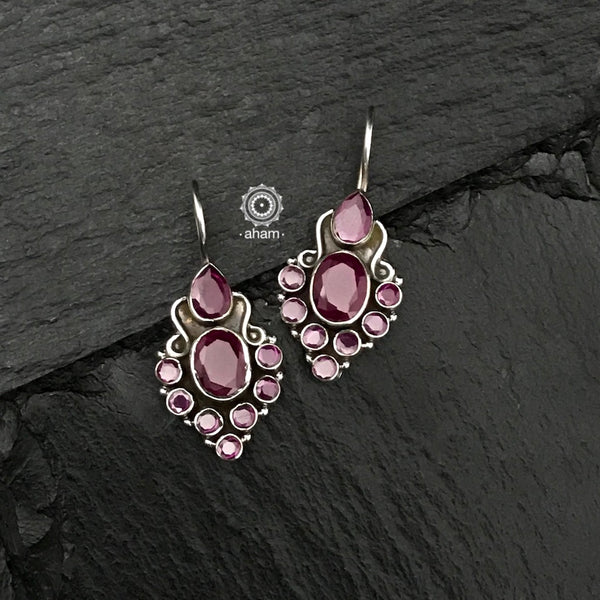 92.5 Sterling Silver Earrings with maroon coloured stones. Light weight and easy to wear 