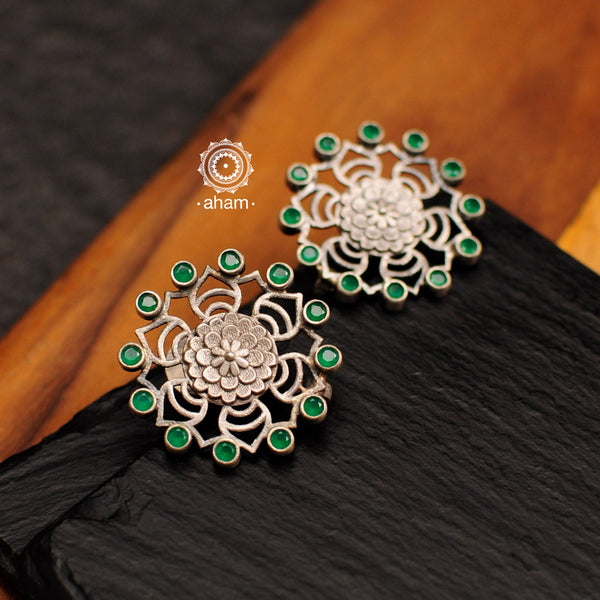 Everyday wear Summer Love flower studs. Handcrafted in silver with green coloured stone highlights. 