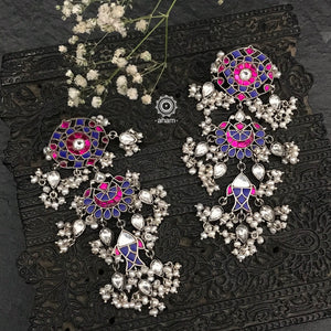 Handcrafted in 92.5 sterling silver with floral motifs and semi precious stones. These statement festive flower earrings will add more bling and drama to your jewellery collection.  