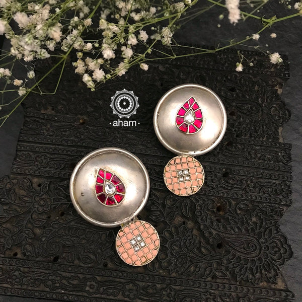 Handcrafted in 92.5 sterling silver with floral motifs and semi precious stones. These Festive Kemp drop earrings will add more bling and drama to your jewellery collection.  