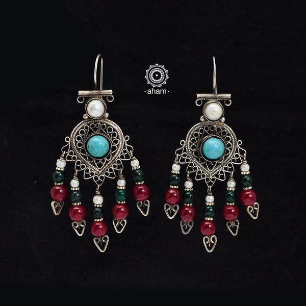 The earrings are sourced from the Turkmen central Asia regions.  The dents, the marks, the irregularities all add to the charm and tell a story of where they comes from.