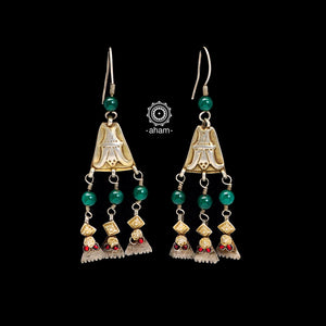 The earrings are sourced from the Turkmen central Asia regions. The dents, the marks, the irregularities all add to the charm and tell a story of where they comes from. 