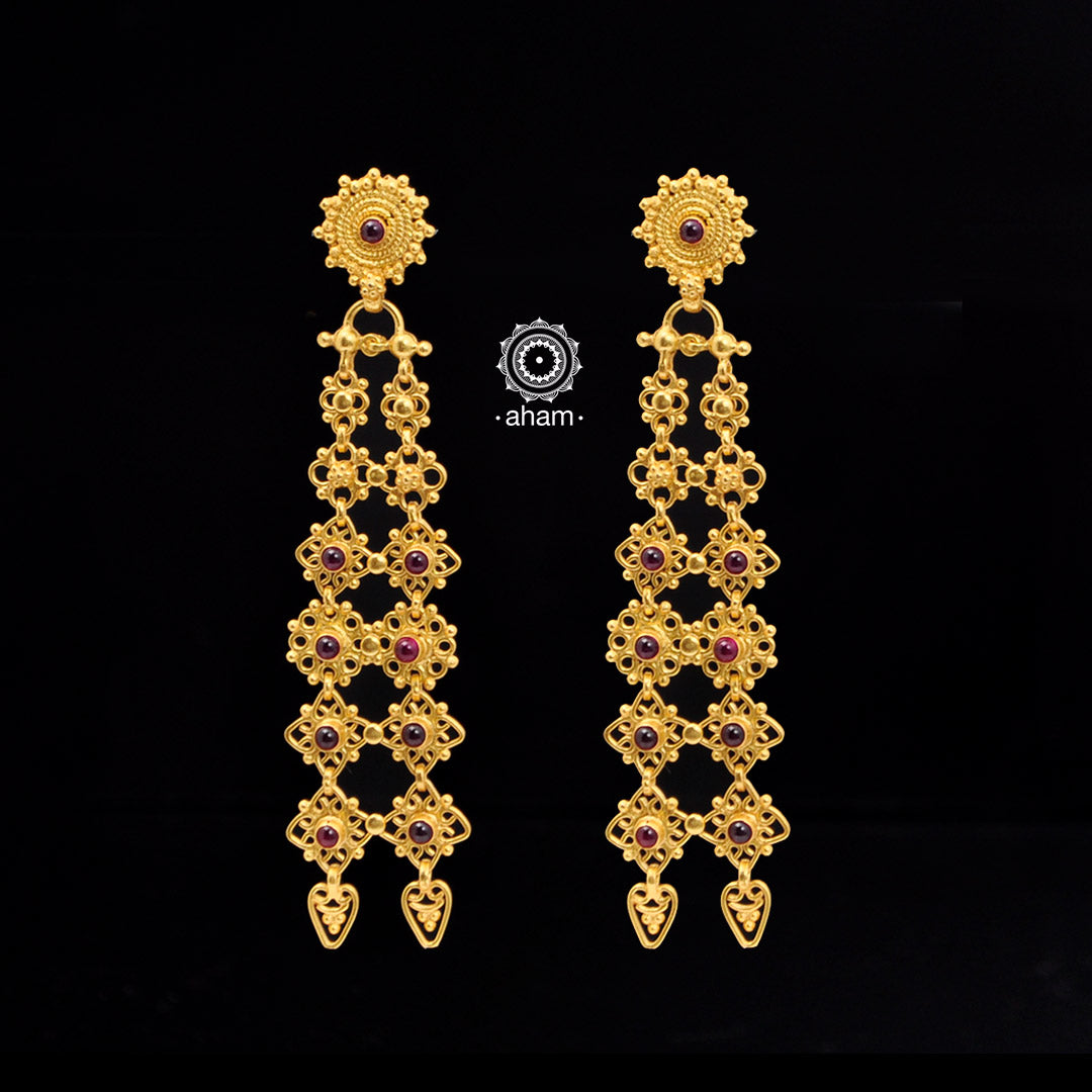 Catch everyone's attention with this beautiful Sterling Silver (92.5%) uniquely designed earring. Crafted using ancient South Indian antique gold temple jewellery technique,  the entire piece is made in pure silver and dipped in go