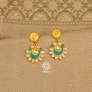 Handcrafted gold polish turquoise coloured crescent. Crafted using traditional techniques in 92.5 sterling silver with cultured pearls. Perfect for special occasions and upcoming festive celebrations. 