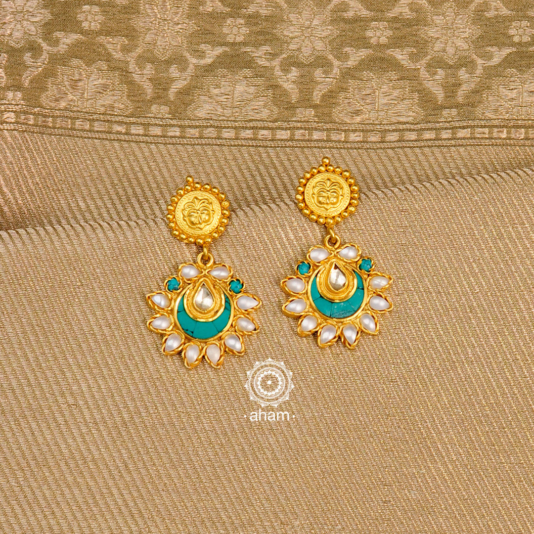 Handcrafted gold polish turquoise coloured crescent. Crafted using traditional techniques in 92.5 sterling silver with cultured pearls. Perfect for special occasions and upcoming festive celebrations. 