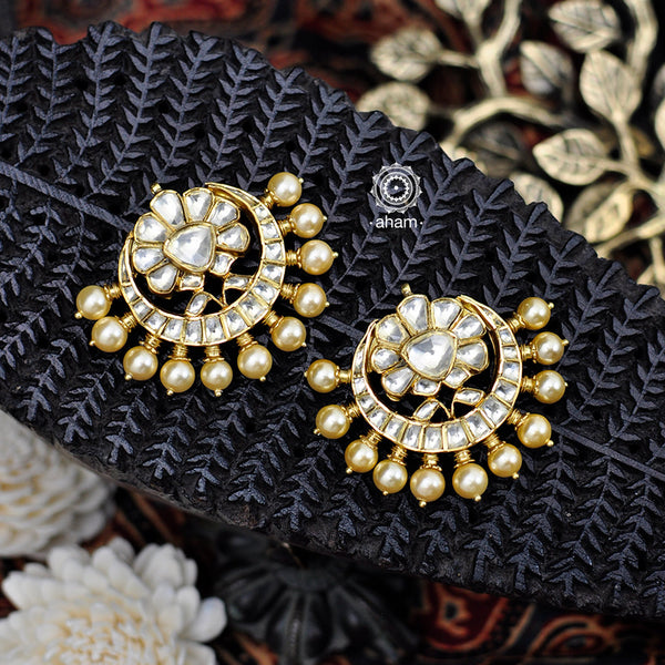 Feel like royalty when dressed in these Kundan Chandbali Gold Polish Silver Earrings with semi precious stones and cultured pearls. Perfect for special occasions and festivities 
