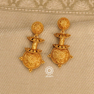 Gold polish layered silver earrings with intricate floral work. Handcrafted using traditional techniques in 92.5 sterling silver and intricate artistry. Perfect for intimate weddings and upcoming festive celebrations. 