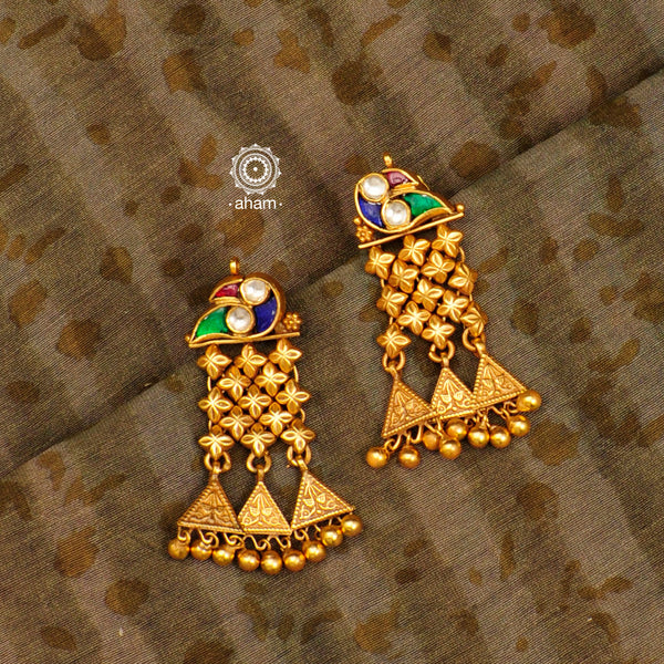 Handcrafted mini silver jhalar earrings with gold polish and bird motif stud. Pair these lightweight earrings with your favourite ethnic outfit to complete the look.