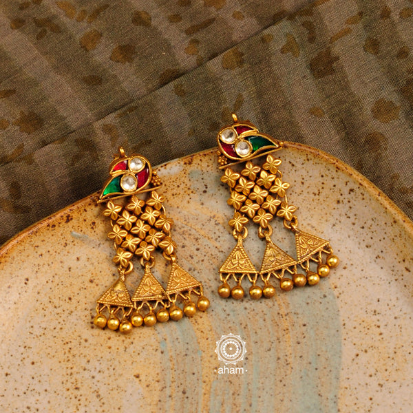 Handcrafted mini silver jhalar earrings with gold polish and bird motif stud. Pair these lightweight earrings with your favourite ethnic outfit to complete the look.