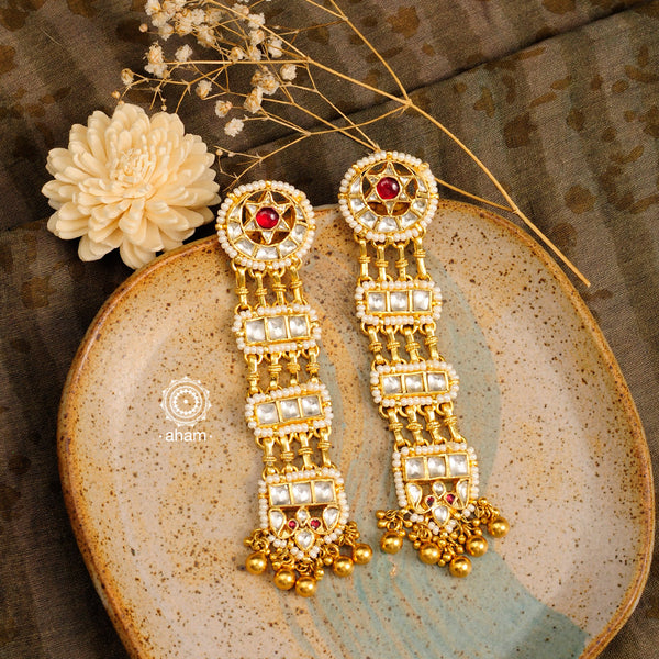 Statement festive kundan earrings handcrafted in 92.5 sterling silver with gold polish and cultured pearls. Perfect for intimate weddings and upcoming festive celebrations. 