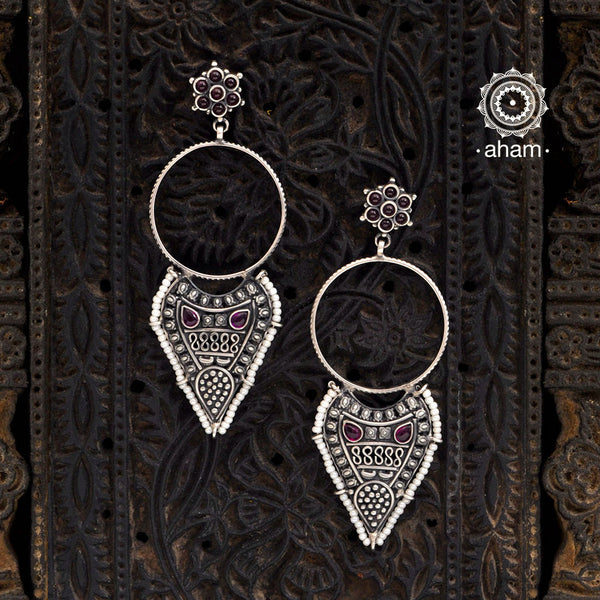 Handcrafted 92.5 sterling Silver earring from our Malhar collection.  hand silver work, with kemp stone highlights and laced with pearls 