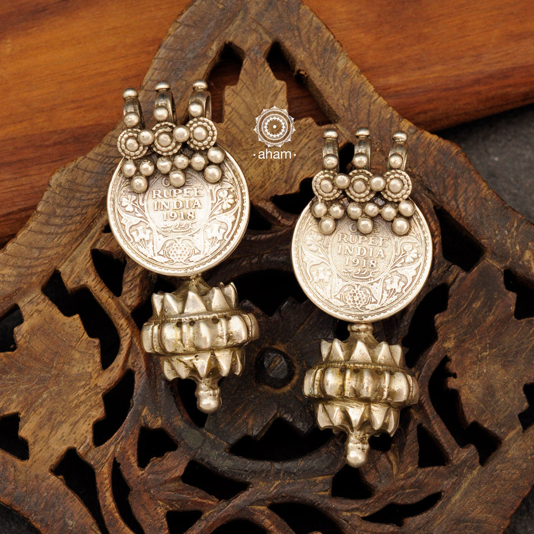 Tribal vintage silver coin earrings.  A piece so stunning that is bound to make a statement. Perfect to wear this Navratri. 