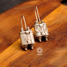 There is a different charm to old world pieces.  so unique, so beautiful, heirloom pieces.  Tribal silver earrings that will make a beautiful edition to your collection. Please note since these are made from assorted old pieces, there might be some minor variations between the two pieces. 