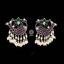 Classic Kemp 92.5 sterling silver earrings laced with pearls.