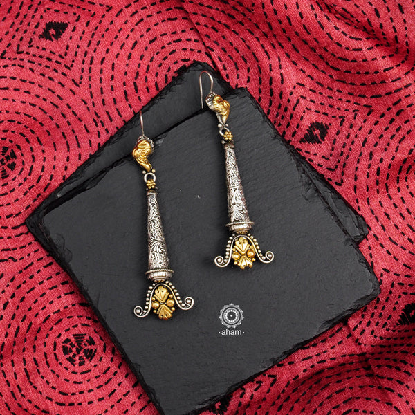 Noori two tone drop earrings handcrafted in 92.5 sterling silver with intricate floral work. Style this up with your favourite ethnic or fusion outfit.