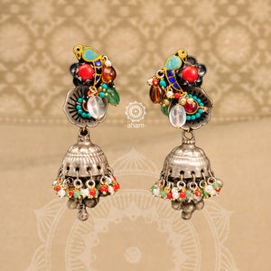 Noori statement silver two tone jhumkie earrings. One of a kind piece, Handcrafted with beautiful bird motif, semi precious stones and cultured pearls. Style this up with your favourite ethnic or fusion outfit.