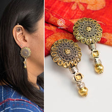 Handcrafted Noori two tone earrings in 92.5 sterling silver with beautiful floral  work. Style this up with your favourite ethnic or fusion outfit.