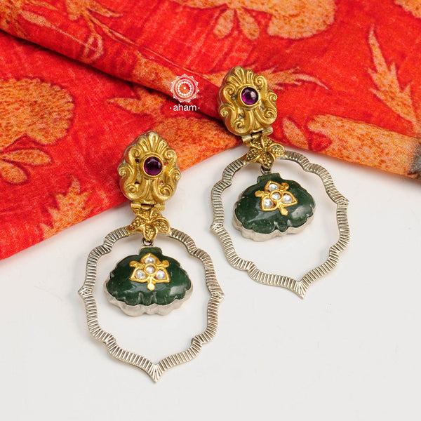 Handcrafted in 92.5 sterling silver are these Artistic carved tops & Green Stone Drop within a beautiful floral frame. These earrings are a perfect accent to compliment a minimal ensemble. 
