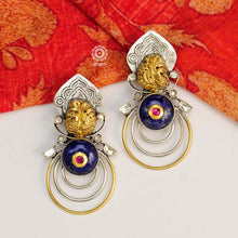 Dual Tone Earrings crafted in 92.5 sterling silver with Nakshi work Peacock, Lapiz stone highlight and kundan highlights. These earrings are a perfect accent to compliment a minimal ensemble. 