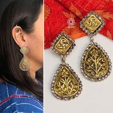 Handcrafted Noori two tone earrings in 92.5 sterling silver. With beautiful floral chitai work and zircon stones. Style this up with your favourite ethnic or fusion outfit.