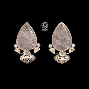 Beautiful 92.5 sterling silver drop earrings with carved floral motif on rose quartz. Can be paired with both ethnic and western outfits. 