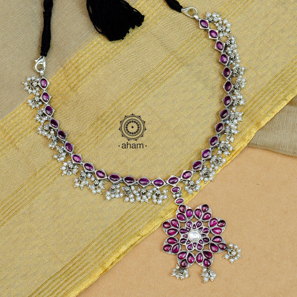 Nrityam 92.5 sterling silver flower neckpiece with maroon kemp stone setting and cultured pearls. Perfect for attending wedding ceremonies and special occasions.