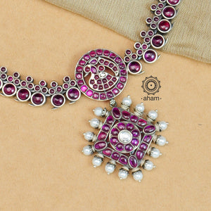 Nrityam neckpiece crafted in 92.5 sterling silver with an elegant swan motif in the center, maroon kemp stone setting and cultured pearls