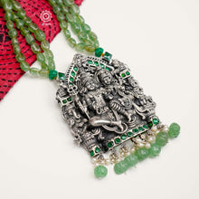 Beautiful sculptural Shiv Paravti pendant with semi precious bead stone chain makes this a unique neckpiece. Crafted in 91.5 sterling silver with green spinel stones and pearls.  