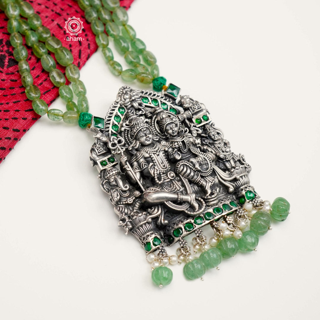 Beautiful sculptural Shiv Paravti pendant with semi precious bead stone chain makes this a unique neckpiece. Crafted in 91.5 sterling silver with green spinel stones and pearls.  