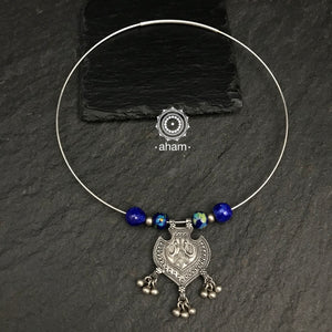 Handcrafted 92.5 sterling silver everyday wear hasli. Including silver peacock pendant and Jaipur blue pottery beads in Wire Hasli. Easy to wear, looks great with Indian and Western outfits. The Hasli is easily removable and can be used with any other pendant as well. 
