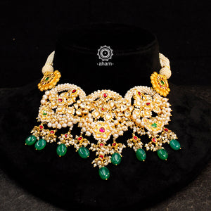 Make a sophisticated style statement this festive season with our Nath inspired neckpiece with cultured pearls. Handcrafted using traditional kundan jadua techniques in 92.5 sterling silver with gold polish and green semi precious beads . Perfect for intimate weddings and upcoming festive celebrations.
