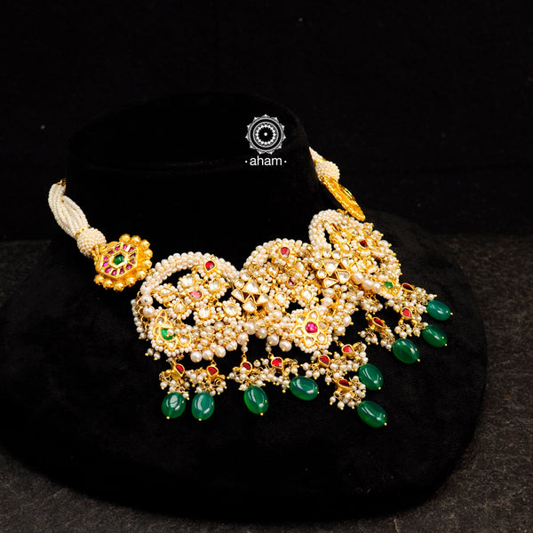 Make a sophisticated style statement this festive season with our Nath inspired neckpiece with cultured pearls. Handcrafted using traditional kundan jadua techniques in 92.5 sterling silver with gold polish and green semi precious beads . Perfect for intimate weddings and upcoming festive celebrations.