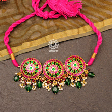  Beautiful gold polish flower choker with green & pink kundan work. Handcrafted 92.5 sterling silver with semi precious beads and dangling cultured pearls. Pair this neckpiece with your ethnic outfits this festive season to complete the look.