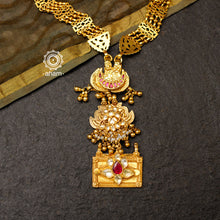 Classic gold polish neckpiece handcrafted using traditional techniques in 92.5 sterling silver with kundan highlights and cultured pearls. Perfect for intimate weddings and upcoming festive celebrations. 