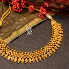 Gold polish neckpiece with intricate floral patterns. Handcrafted in 92.5 sterling silver using traditional techniques. Perfect for intimate weddings and upcoming festive celebrations.