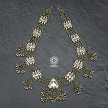 Handcrafted Tribal silver multi chain neckpiece with intricate work. A statement piece that will never go out of style, this necklace is a perfect addition to your collection.