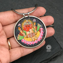 Hand painted silver Ganesha pendant. Intricate miniature painting work done by skilful artisans to create these beautiful wearable art pieces. 