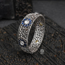 South Indian traditional handcrafted 92.5 sterling silver floral work and blue spinel stone highlights. Classic styles that never fade with time. 