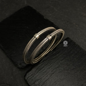 Handcrafted everyday wear bangles textured in 92.5 sterling silver.