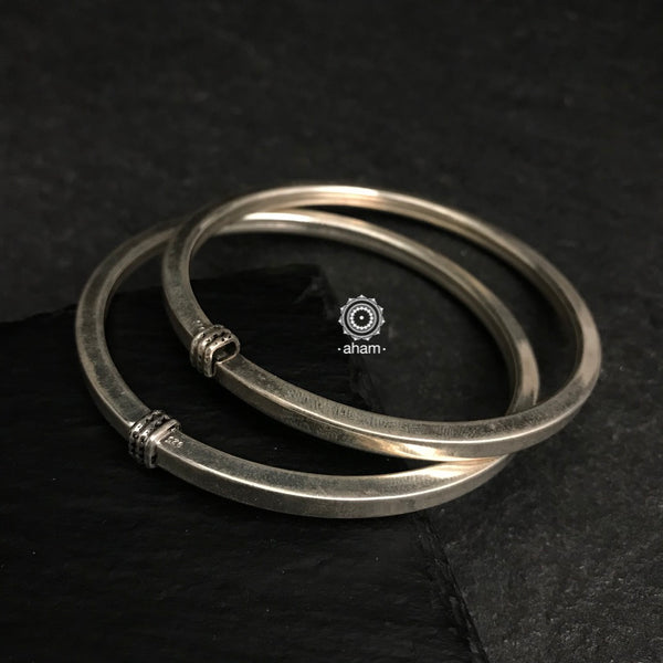 Handcrafted twist and wear bangles in 92.5 sterling silver.